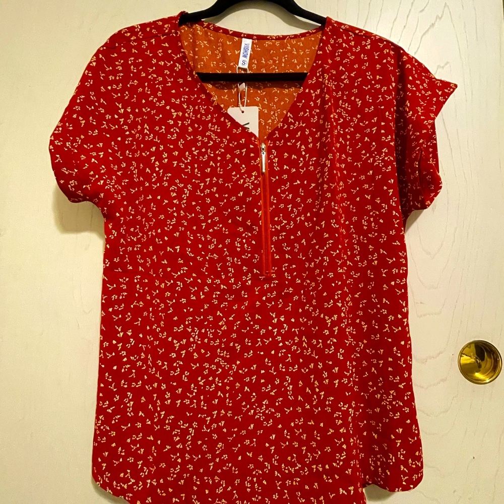 Women’s red/ orange floral blouse